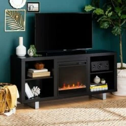 4 Cubby Modern Electric Fireplace with Metal Legs TV Stand for TVs up to 65" - Saracina Home Black