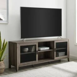 Industrial Farmhouse Sliding Mesh Door Console TV Stand for TVs up to 80" - Saracina Home Faux Dark Concrete/rustic Oak